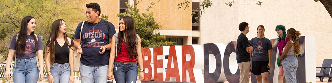 students at Bear Down sign